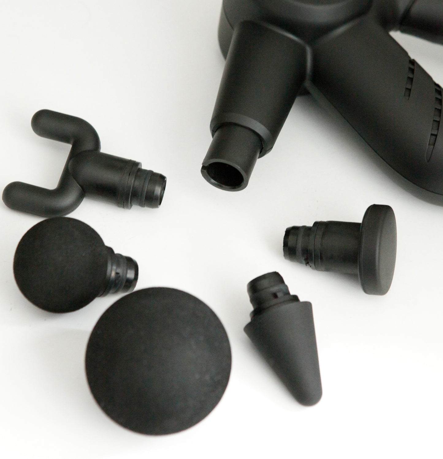 Massage gun attachments including various shapes for effective muscle recovery and vibration therapy.