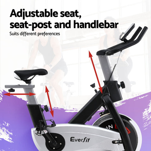 Flywheel Spin Bike with adjustable seat, seat-post, and handlebars for personalized comfort and performance.