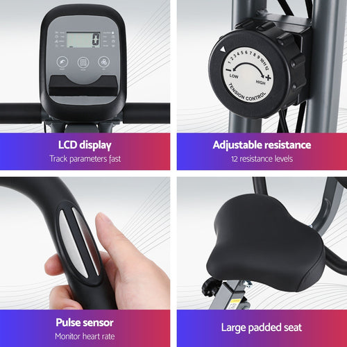 Close-up of Folding Exercise Bike features: LCD monitor, adjustable resistance, pulse sensor, and large padded seat for comfort.
