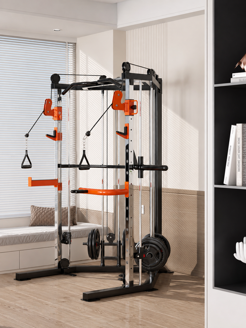 A black and orange multi-functional home gym power rack with weight plates and cable pulleys, set in a modern room with light wood floors and beige walls.