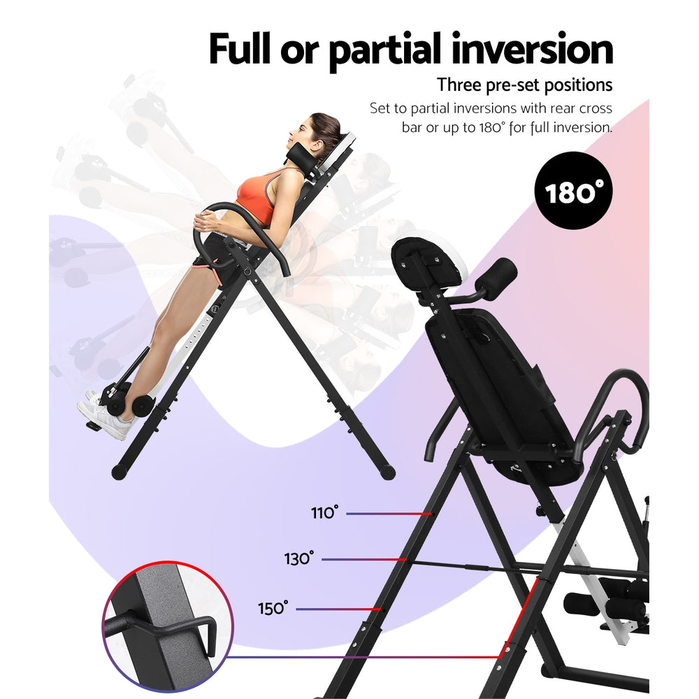 Woman using Everfit Inversion Table Grey for back stretching and posture correction with adjustable inversion angles.