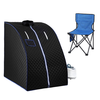 Portable steam sauna tent 1000W with a steamer and a folding chair for home spa relaxation.