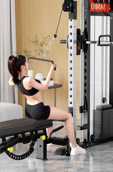 Smith Machine M1 Max Functional Trainer in use by a woman in a home gym setting.
