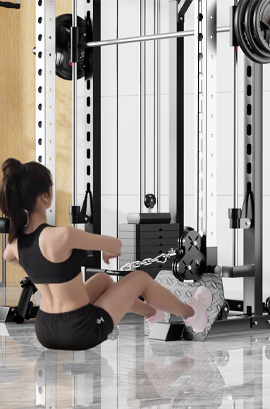 Home Gym Package M1 Max Smith Machine 140kg Pin Loaded in use with a person performing seated cable row exercise.