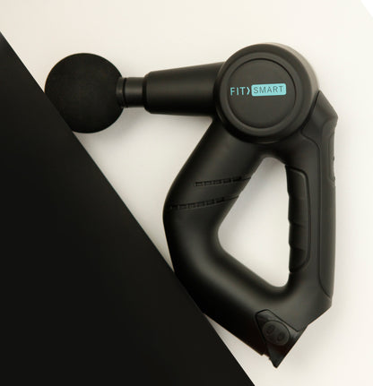 Massage gun FitSmart features ergonomic design and vibration therapy attachment for muscle recovery and soreness relief.