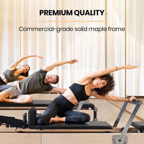 Three people using a Pilates Reformer, showcasing premium quality and commercial-grade solid maple frame.
