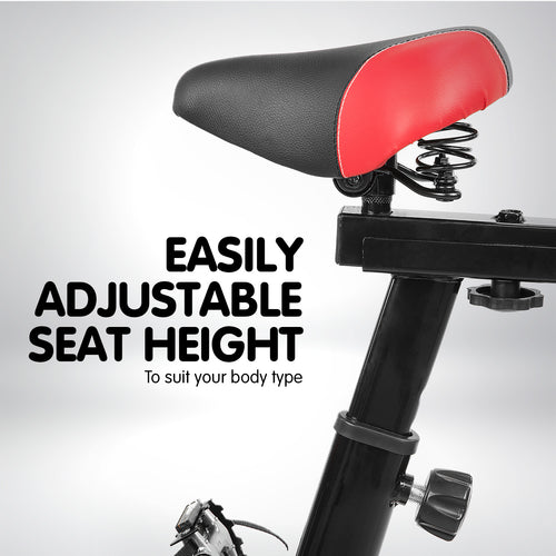 Easily adjustable seat height on the Flywheel Spin Bike for customized comfort during workouts.