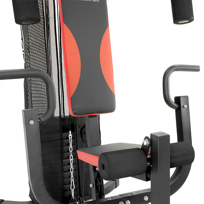 Powertrain Multi-Station Home Gym featuring a boxing bag, speedball, and exercise seat for versatile workouts.