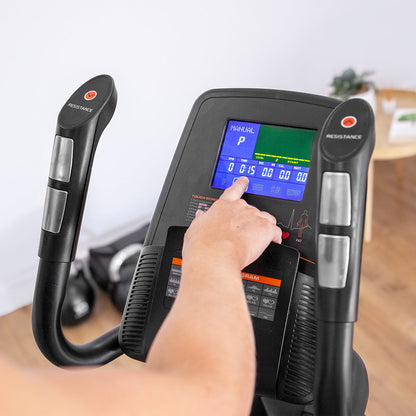 Person adjusting settings on Lifespan Fitness XT-40 Cross Trainer's digital display panel for resistance control.