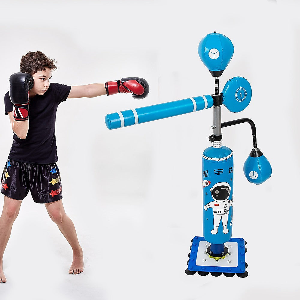 Child practicing with Kids Boxing Punching Bag Fitness set featuring blue punching bag and gloves.