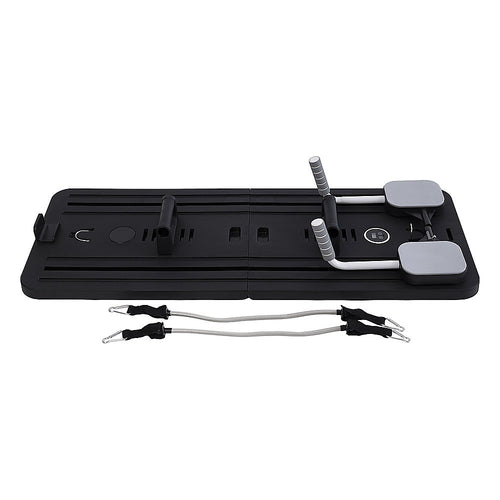 Abdominal Board Pilates Reformer on a flat surface with resistance bands attached, ideal for core training and stability.