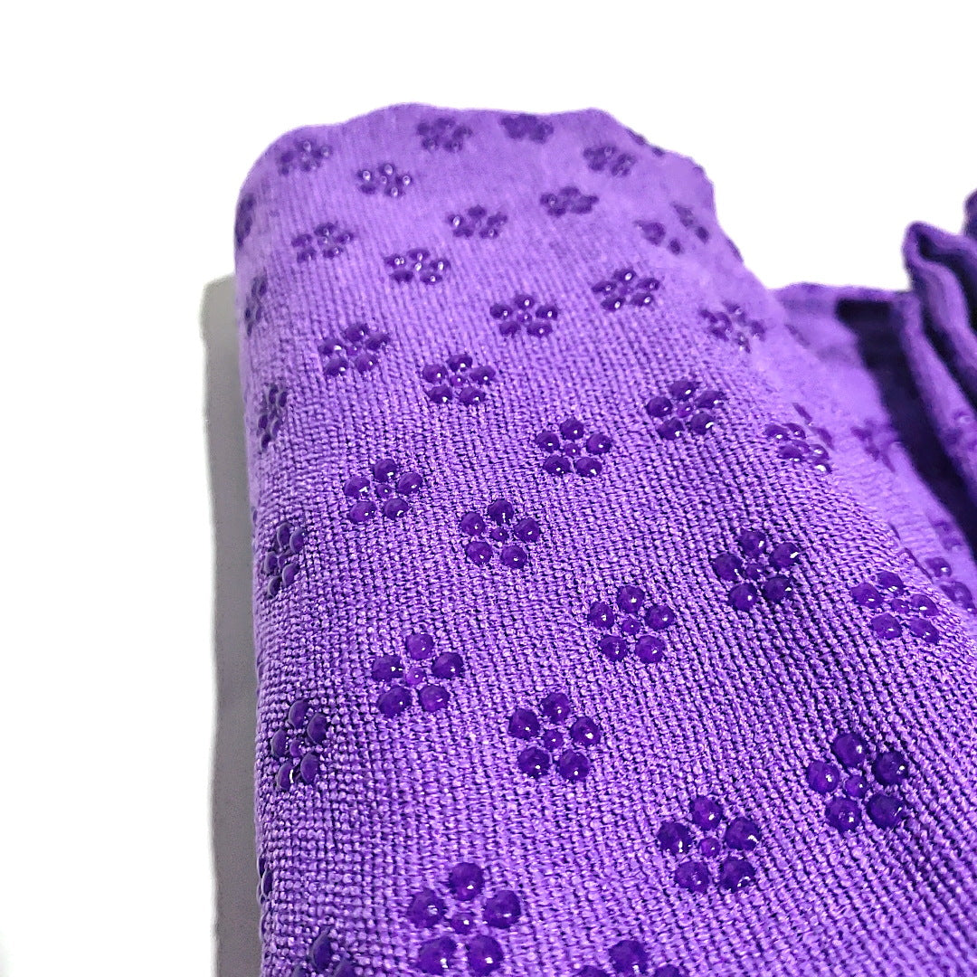 Portable green yoga towel for workouts