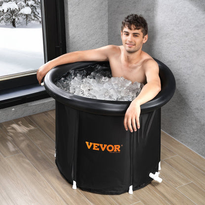A person enjoying an ice bath tub filled with ice, showcasing the portable cold plunge for recovery.